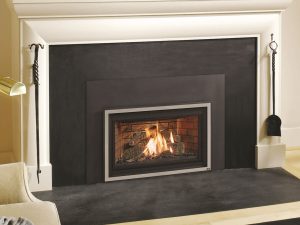 Black mantel with gas fireplace insert