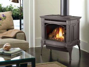 Cast iron gas stove burning in cozy living room